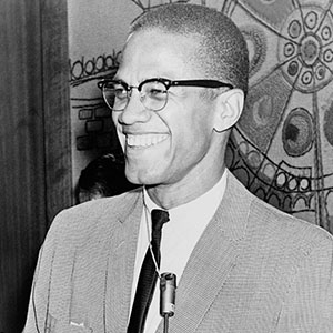 malcolm x smiling